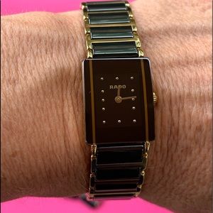 Rado Women’s black and gold bracelet watch